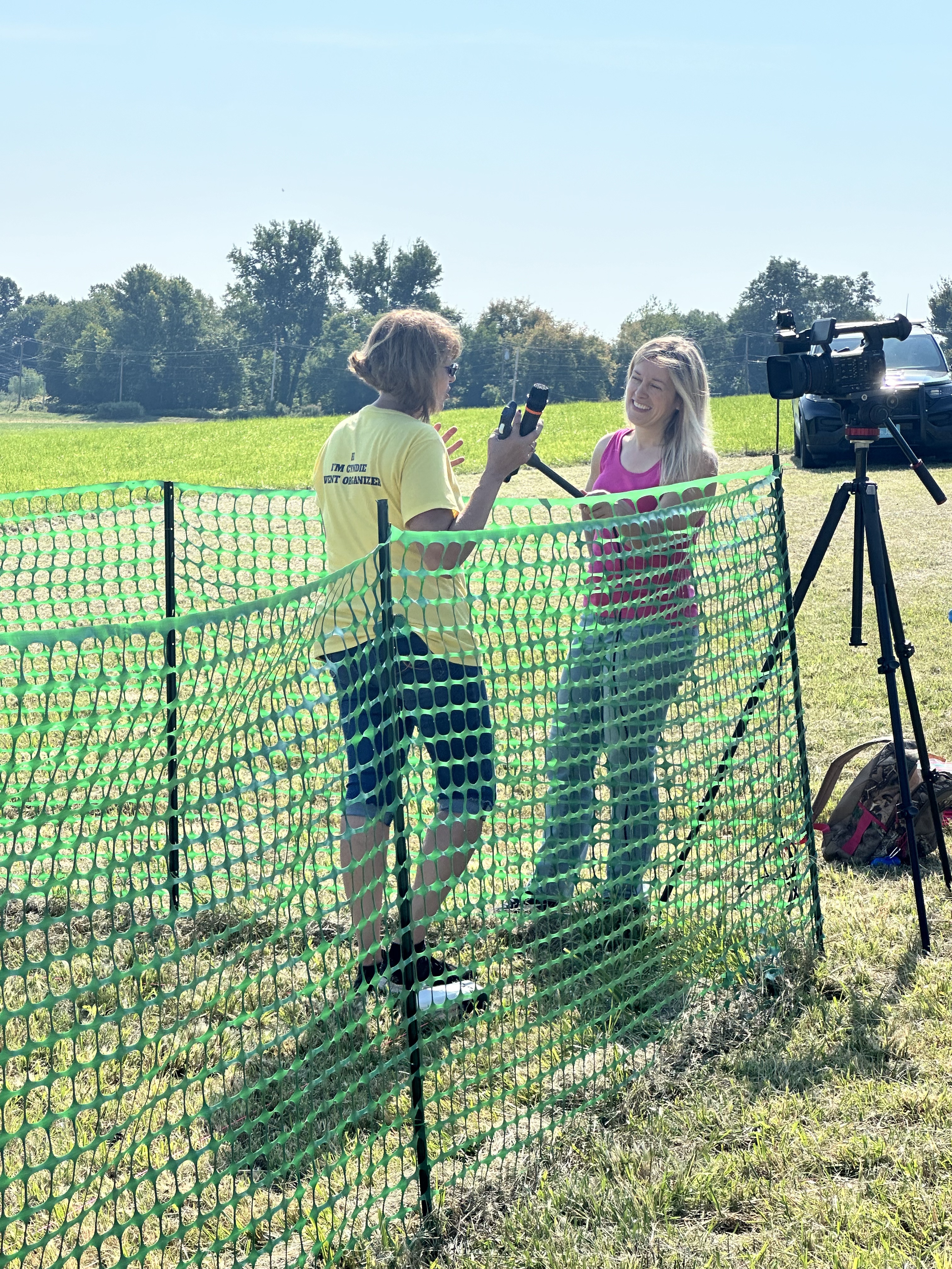 Cyndie Morgan, Event Organizer being interviewed by Lindsay from HC Media